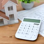 Architectural,Model,Of,A,House,,House,Drawings,,And,Calculator