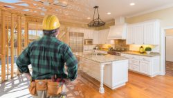 Contractor,Standing,In,Front,Custom,Kitchen,Construction,Framing,Gradating,Into