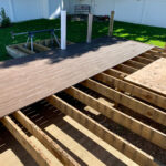 Remodeling,A,Deck,In,A,Suburban,Backyard.,The,Contractor,Is